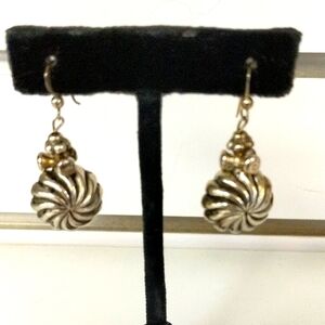 Silver tone shell motif earrings